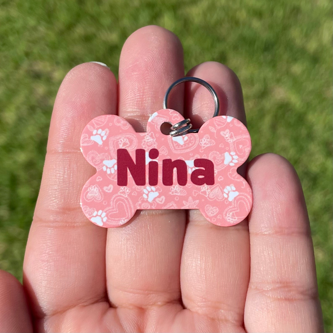 Plaquita de color rosa huellitas