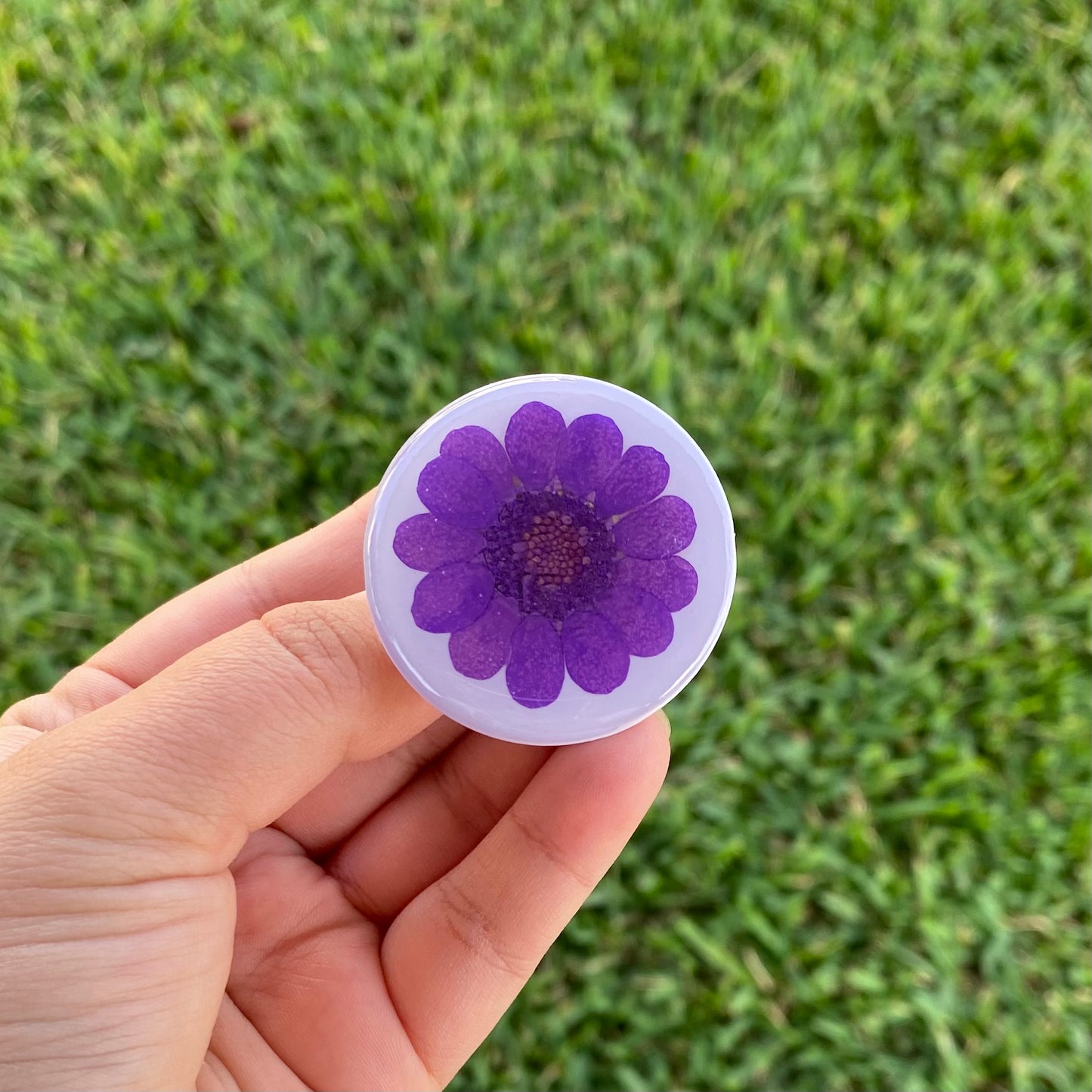 Holder con flor real morada