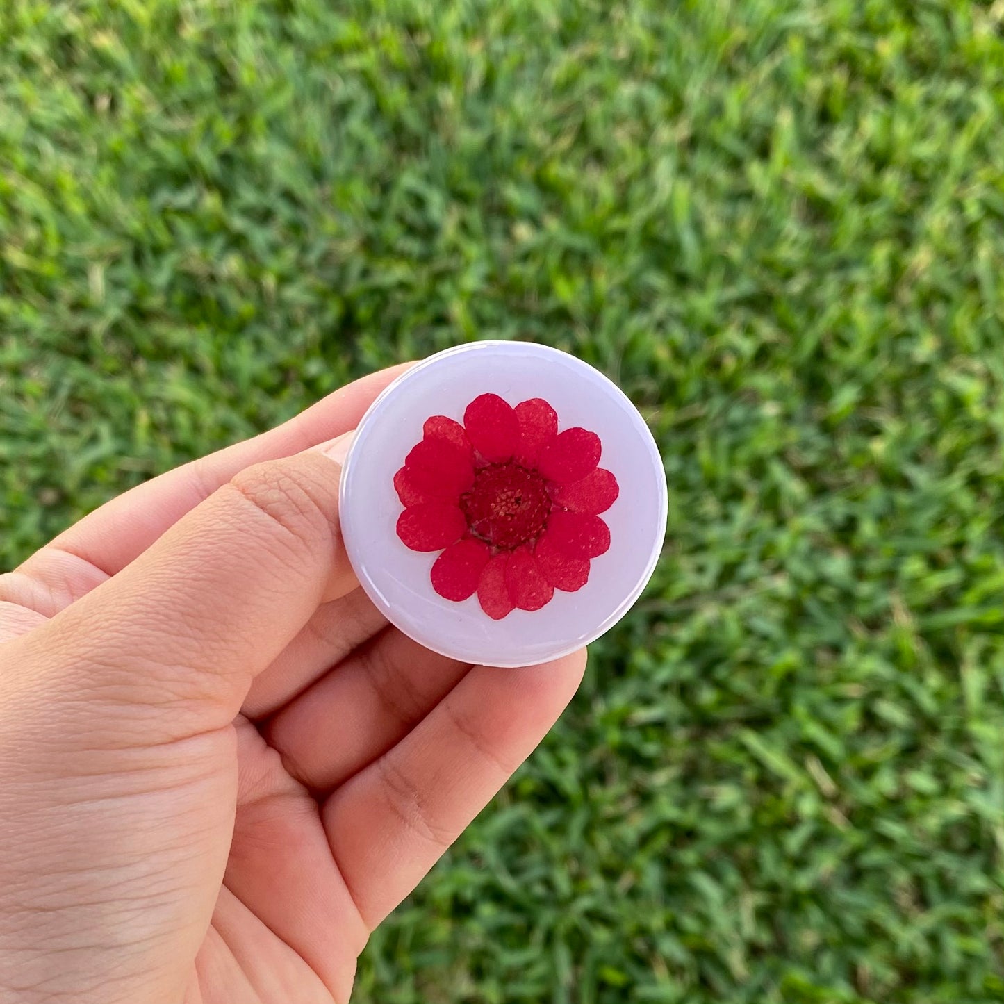 Holder con flor real rosa fuerte/rojo