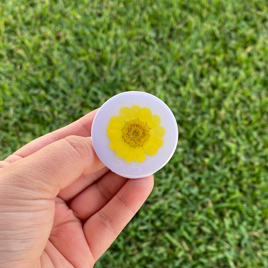 Holder con flor real amarilla